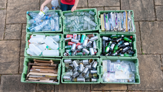 Various recycling bins heading for post-consumer recycled packaging