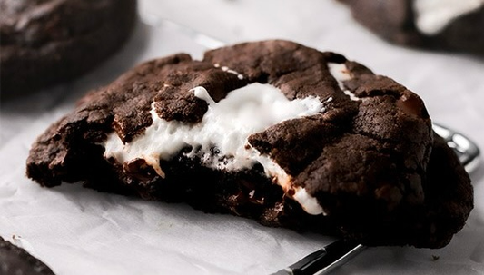 Cross-section of a chocolate marshmallow cookie with black cocoa powder