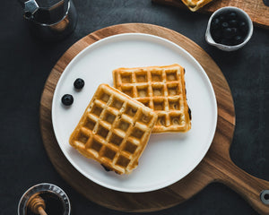 Golden malted waffles with fresh berries