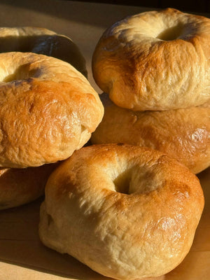 Stack of golden-brown homemade bagels