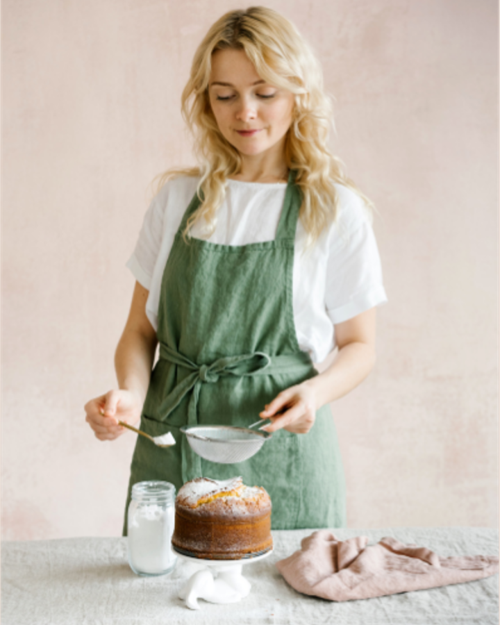 Baker smiling with fresh bread